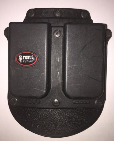 Se vende magnífica funda de polímero, del fabricante FOBUS, para cargadores monohilera de pistolas 1911.
La 00