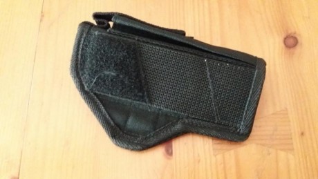 Vendo  funda de cordura ambidextra , color negro, para  CZ-75/85, GP-35 y similares , también puede acoger 00