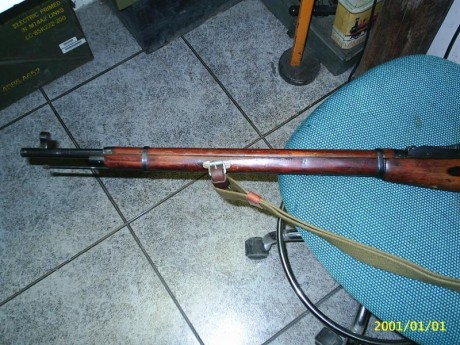 Vendo un mosin nagant con letras rusas de 1926 y regalo un visor que se monta en el alza y tira de cine 00