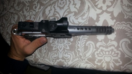 Vendo pistola sps de open hibrida, calibre 38 super, va a la perfeccion pocos tiros, afinada, grip picado 00