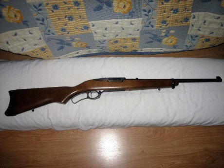 Hola.  Vendo este rifle, con cuatro cargadores de 4 disparos, cantonera de caucho y  la original, anillas 12