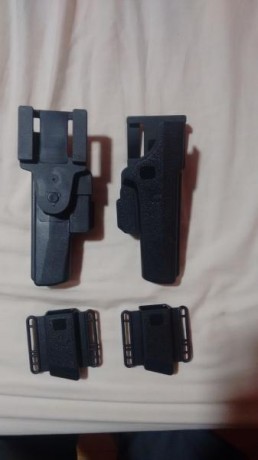 Vendo dos fundas glock  nuevas a estrenar con su respectivo portacargador , con seguro anti hurto, funda 00