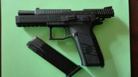 VENDO PISTOLA CZ P09 NUEVA, HE PEGADO MENOS DE 100 DISPAROS CON ELLA, VIENE CON UN SOLO CARGADOR DE 19 00