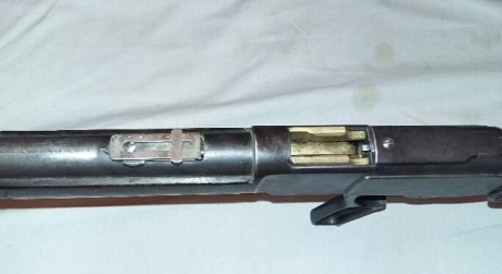 Buenas,
¿podriais ayudarme a identificar esta arma por sus marcas? Lo anuncian como un winchester 1873 21