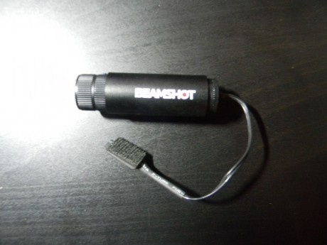 Vendo un monocular nocturno marca bresser 5x50 y un laser para pistola sin carril beamshot, el monocular 00