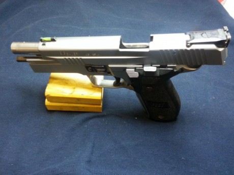 Hola, vendo mi arma de trabajo, muy pocos disparos, la tengo desde el 2013 como arma de servicio, guiada 00