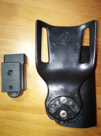 Buenas tardes.

Vendo funda antihurto PARA ZURDO la vega holster MDS8  y un portacagardor vega holster, 01
