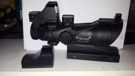 Se vende trigicon convinado retina tactical mas punto rojo. 00