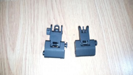 Por falta de uso vendería SIG 522, con sus accesorios.

Tiene montado un quad rail, y también tiene el 10