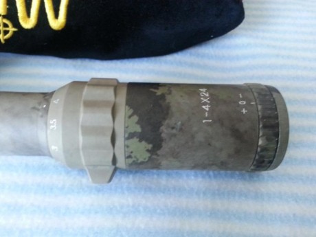 Vendo visor millett DMS 1-4x24 con tubo de 30mm y reticula DOT iluminada roja, estaba montado en un cetme 21