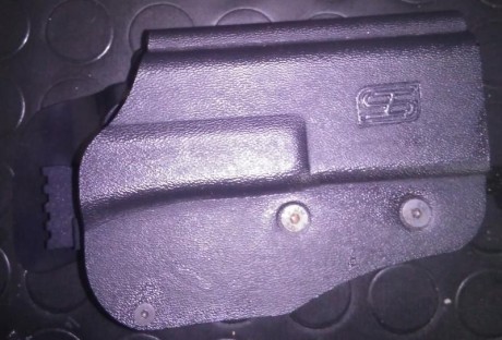 Se vende funda marca HS para pistolas Glock, la he probado con la 17 y entra perfecta, enganche rápido 02
