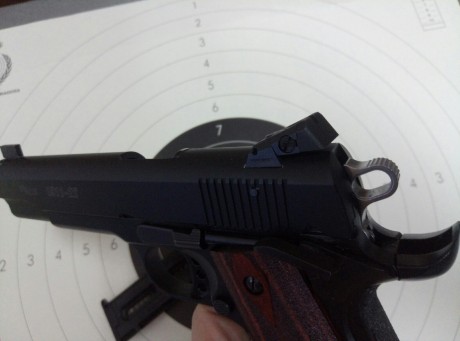 Hola, vendo pistola Sig Sauer 1911 cañ. 22lr., primer propietario, con un año de uso y aproximadamente 00