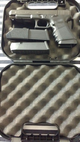 se cambia glok 34 por pistola del 9 + carro del 22 ajustando diferencia la pistola esta nueva como se 02