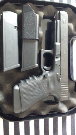 se cambia glok 34 por pistola del 9 + carro del 22 ajustando diferencia la pistola esta nueva como se 01