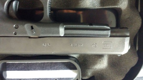 se cambia glok 34 por pistola del 9 + carro del 22 ajustando diferencia la pistola esta nueva como se 00