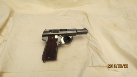   Vendo o cambio pistola ASTRA 3000 Purito con dos cargadores y dos juegos de cachas madera y baquelita 00