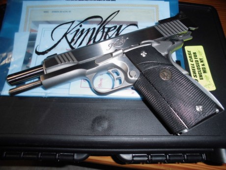 Hola compañeros,
  VENDIDA   Pongo en venta esta Kimber Gold Match II en acero inox y calibre 9mm, la 11