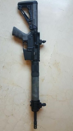 ...Como quiera que no le doy uso pues cuenta sólo con unos 80 disparos, se vende conjunto formado por:

-DPMS 01