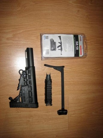 Hola. Vendo este rifle impecable, con muchos accesorios, cargadores de 10 y de 30, bípode original, dos 31