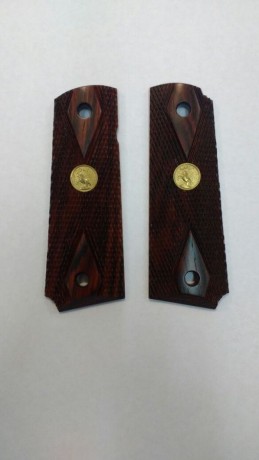 Estoy interesado en la compra de unas Cachas originales Colt Custom Shop de lujo para 1911 , que no sean 02