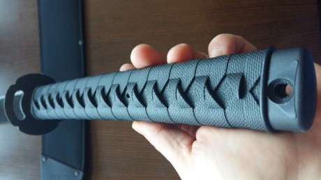 Cambio movil iphone 5 C color rosa es libre 16 gb y una katana de cold steel acero carbono 1055 muy afilada 21