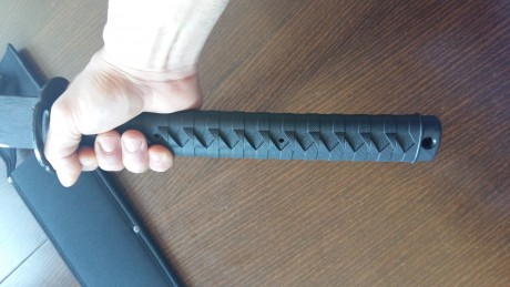 Cambio movil iphone 5 C color rosa es libre 16 gb y una katana de cold steel acero carbono 1055 muy afilada 20