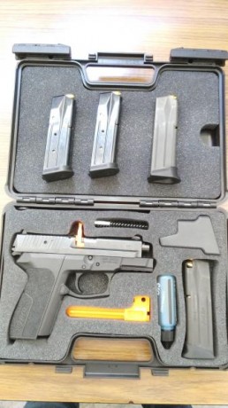 VENDO SIG SAUER 2022 SPC 2009 9mm POR NO USARLA, GUIADA CON LICENCIA A. EN SU CAJA ORIGINAL Y CUATRO CARGADORES. 00