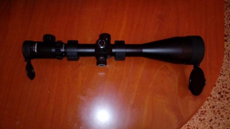 vendo visor visionking 8x48x65 IR tubo de 35 mlm, anillas incluidas para carril de 11 esta completamente 11