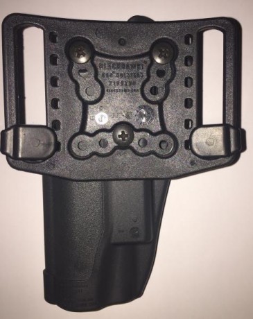 Se vende esta magnifica funda BLACKHAWK SERPA, con sistema de seguridad antihurto y presión ajustable, 01