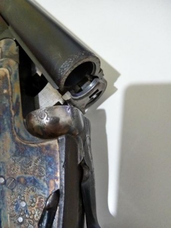 Cambiaría por rifle semiautomático, aportando diferencia. Escopeta paralela Aya, posiblemente modelo 116? 01