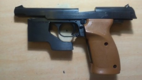 En venta Norinco TT Olympia 22 lr , muy nueva , no llega a 300 disparos , la compre para la niña y no 02