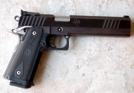 Hola compañeros, vendo mi "STI EAGLE 2011 6 PULGADAS 9mm" un gran arma de la cual ya poco se 01