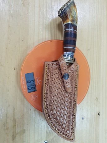 hola, lo había hecho para mí pero lo vendo para compra de material...

cuchillo de caza estilo scagel
acero 41