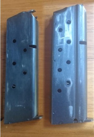 Vendo pistola modelo 1911 de Norinco con dos cañones: 45 ACP y 9 mm, cachas de madera, alza para el cañon 10