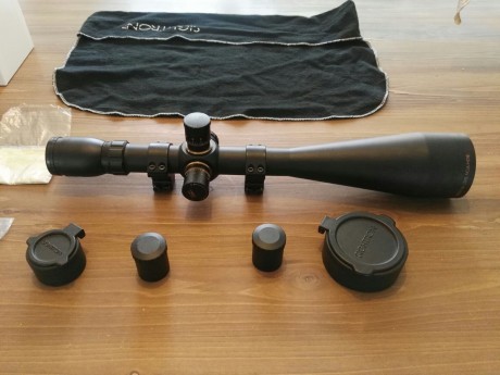 Se vende visor sightron S III SS con 50 aumentos variables,Con anillas incluidas y tapas de botones y 02