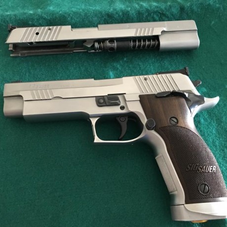 Sig Sauer X five single action 5" mas carro de 6".
4 cargadore, todo en sus cajas originales, 01