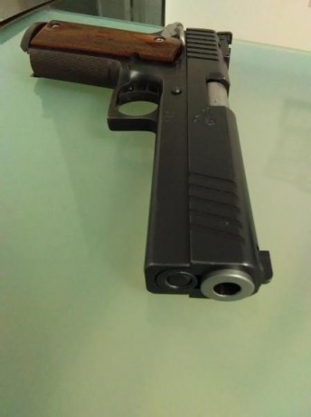 Buenas a todos.



Range Master 5" Pavonada

Unos 3500 disparos con puntas cobreadas HN, usada para 01