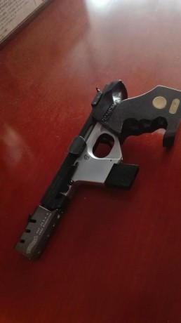 Vendo pistola WALTHER GSP EXPERT CALIBRE 32 con cacha fija en buen estado y con el armazón de la pistola 10