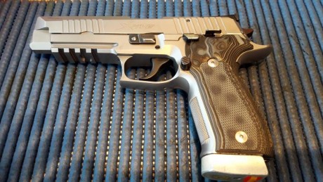 Por cambio de marca pongo a la venta esta máquina...la entregó con 5 cargadores y funda de extracción 20