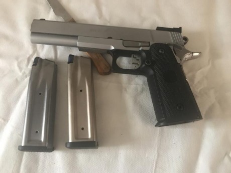 Buenas vendo una pistola SPS 9 mm de precisión con dos cargadores alarma está en Valencia se puede probar 01