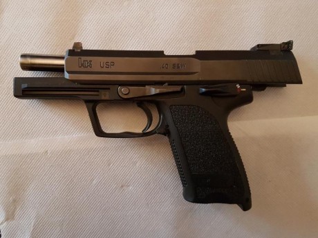 Vendo o cambio pistola HK-USP standar  (la usada por las FF.CC.) pero en calibre 40 S&W.  en perfecto 00