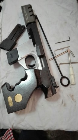 Vendo pistola WALTHER GSP EXPERT CALIBRE 32 con cacha fija en buen estado y con el armazón de la pistola 62