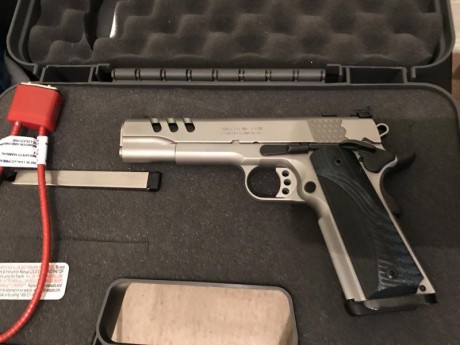 Vendo pistola Cal 45,está en perfecto estado,solo a tirado media caja de municion,su precio 1.700€ 02