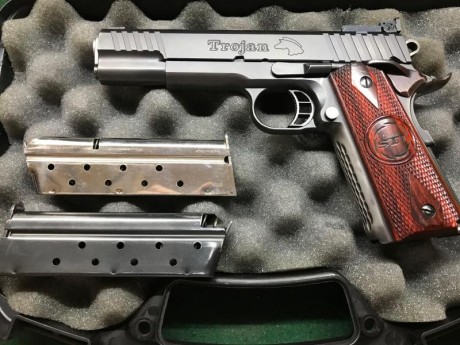 Un amigo me pide que le ponga esta pistola en venta. 
STI Trojan 9 mm para.
5 pulgadas
Como se ve esta 01