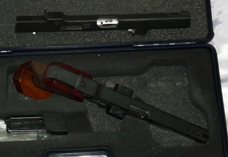 Se vende walther gsp calibre 32 s&w con conversión del 22lr, viene con dos cargadores del 22lr y uno 02