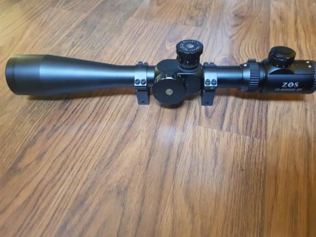 Visor ZOS 10x40x50 retícula mildot iluminada con protectores de lentes y monturas incluidas. 
Caja original
Vision 00