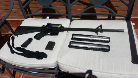 AR 15  OLympic Arms cal 222 Rem.  bull barrel  1”,  paso 9: 1 con  correa de transporte, pistolete anatómico, 00