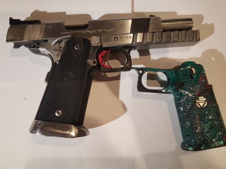 quiero hacer caja para un rifle de IPSC y vendo esta Infinity
Pistola Infinity con:
Un carro calibre 9mm 01