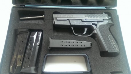 Vendo Sig sauer Sp 2009,pocos tiros(500 aprox.)sólo he tirado con ella munición recargada,2 guias de muelle 01