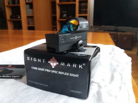 Hola a todos-

Por no hacerme a el, pongo en venta un holográfico de punto rojo de la marca Sight Mark. 11